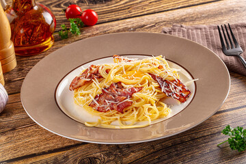 Italian classic spaghetti carbonara with bacon and egg