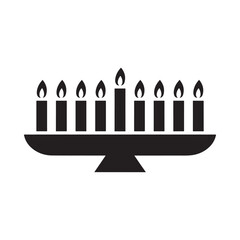 Black silhouette of a menorah with nine lit candles on a white background