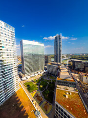 Fototapeta premium Aerial view of modern city district in Bratislava. High angle view of modern district with skyscrapers in Bratislava, Slovakia.