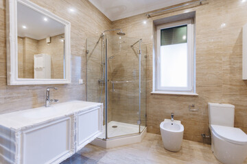 contemporary bath with stylish fittings, modern vanity area with bright lighting and fixtures