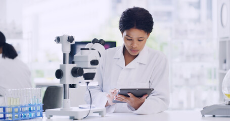 Woman, scientist and research with tablet in lab for notes, medical study and experiment results....