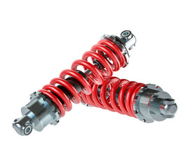 Dynamic Suspension: Two vibrant red shock absorbers rest at an angle, embodying the essence of motion, balance, and the intricate world of engineering.