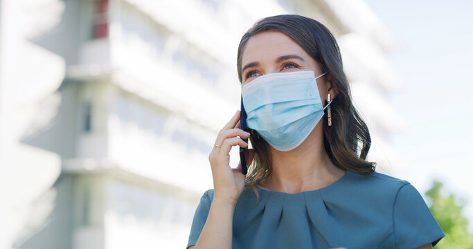 Woman, phone call and face mask in city, talk and contact for property investment deal. Person, smartphone and real estate agent with ppe, communication and listen with discussion on street in town