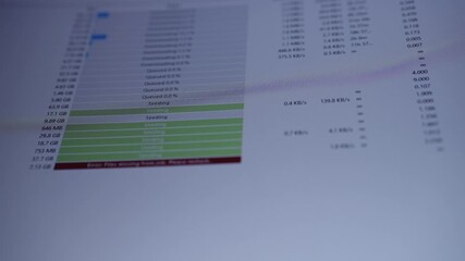 Computer screen showing torrent client seeding and downloading with progress bars and prominent red missing files error, evoking network issues, data loss and troubleshooting, close-up, slow motion. - Powered by Adobe