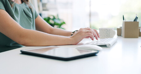 Keyboard, tablet and hands of businesswoman in office with typing for research on finance report with budget. Tech, desk and financial advisor working online for investment proposal in workplace.