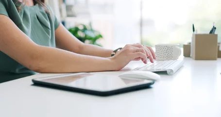 Fotobehang Muziek Keyboard, tablet and hands of businesswoman in office with typing for research on finance report with budget. Tech, desk and financial advisor working online for investment proposal in workplace.  © peopleimages.com