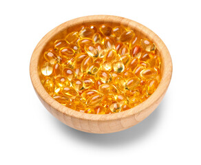 Bowl with vitamin E capsules on white background