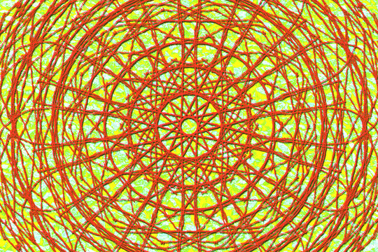 Red spiral pattern of wool thread for crochet on green and yellow