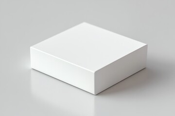 Fototapeta premium minimalist white square box with clean sharp edges on smooth reflective surface against neutral gray background