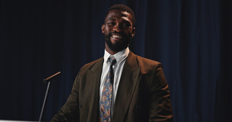 Black man, speaker and portrait with mic for congress, country speech or political statement on...