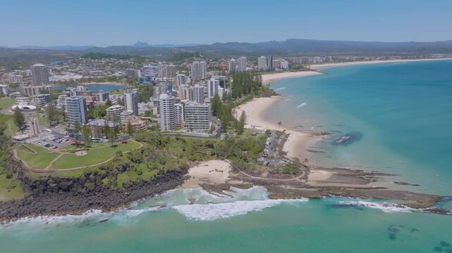 Aerial views of the Tweed Heads and Coolangatta coast and skyline with Snapper Rocks and Rainbow Bay in the foreground and Fingal Head in the background