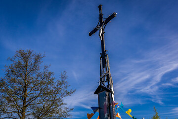 Roadside cross in Jaczew village in Mazowsze region, Poland