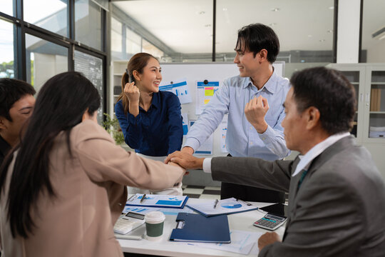 Group of diverse business people discussing a project in a meeting for analysis graph company financial.