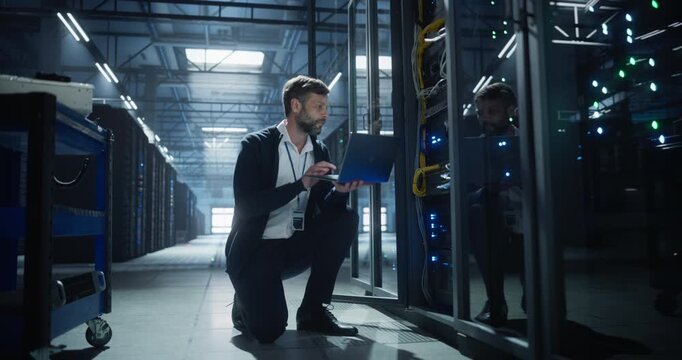 Technician uses a laptop of server rack systems in a data center, analysis of device connections, network cables, electronics for secure business infrastructure, it service, and software operation. - Powered by Adobe