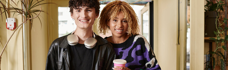 Stylish couple enjoying time together at a vibrant cafe in the afternoon
