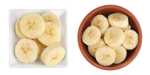 peeled banana pieces in ceramic bowl isolated on white background. Top view. Flat lay.
