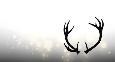 Elegant deer antlers silhouette on bokeh background for decorati