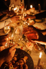 Festive toasting with glasses at a joyful dinner table