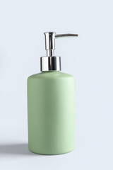Soap dispenser on white background