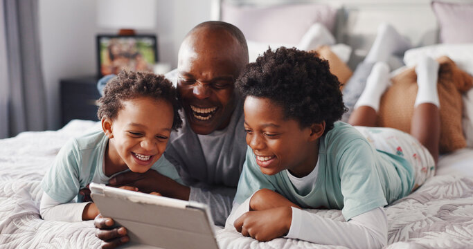 Children, laugh and dad with tablet in bedroom, bonding and watching cartoons with app subscription. Happy, black man and relax with kids on bed, streaming and entertainment on web for family in home