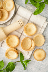 Homemade tartlets on grey background