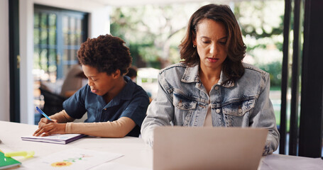 Woman, remote work and laptop with kid learning for proofreading, homework and education. Mother,...