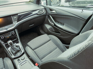 Luxurious modern car interior showcases elegant design, comfortable seating, and advanced features for an enjoyable driving experience in a stylish environment