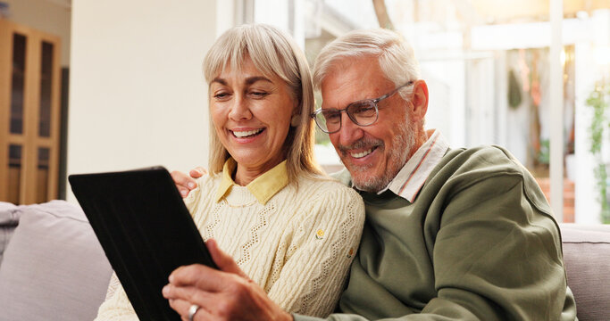 Tablet, relax and senior couple on sofa in home watching film, series or show together. Happy, digital technology and elderly man with woman for streaming movie on app in living room at house.