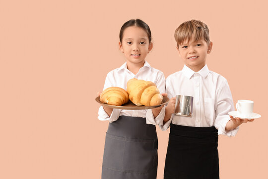 Cute little waiters with croissants and coffee on beige background. Opposite Day celebration