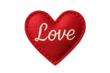 Red heart-shaped fabric plush with white embroidered word 'Love'