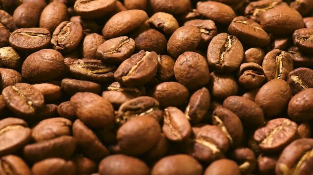 Roasted Coffee beans texture. Espresso ingredient. Food and drinks background	
