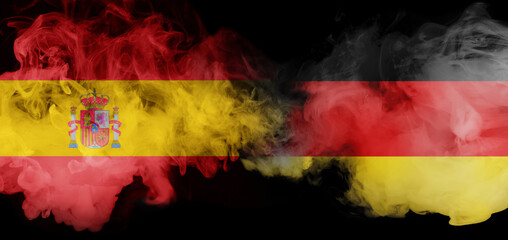 Spain and Germany flags in smoke symbolizing diplomacy and European cooperation. Concept of political relations, trade partnership, and economic integration across Europe. Negative space collage