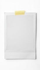 Blank white polaroid frame, isolated on white background, secured with tape , background, frame, photography