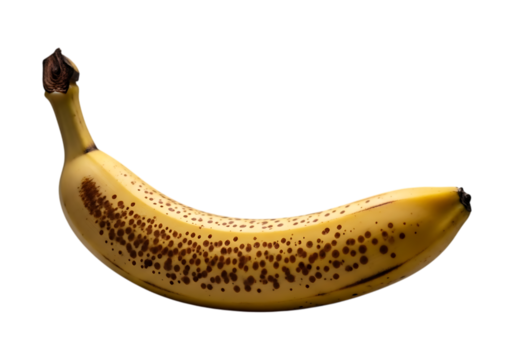 Ripe yellow banana with brown spots isolated on transparent background