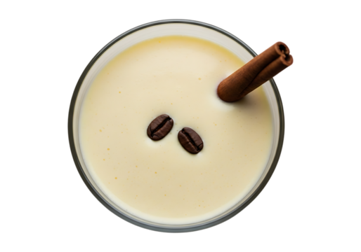 Creamy coffee cocktail with cinnamon stick and beans isolated on transparent background