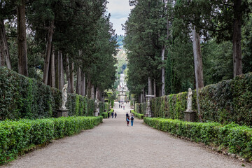 Florence, Italy - April 29, 2023: Boboli Gardens in Florence, Italy features lush greenery, elegant statues, and a serene pathway inviting visitors to explore its historical beauty