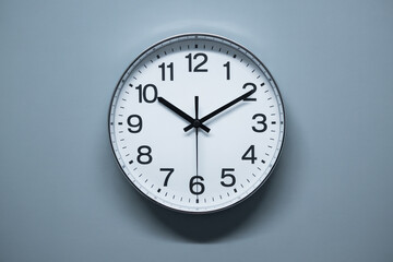 A round office clock.