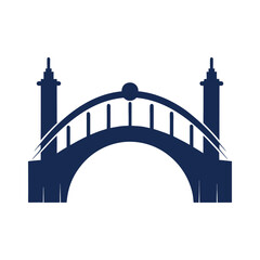 Dark blue silhouette of an arched bridge with towers