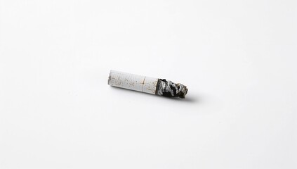 A single cigarette butt on a white surface, highlighting the environmental impact of littering