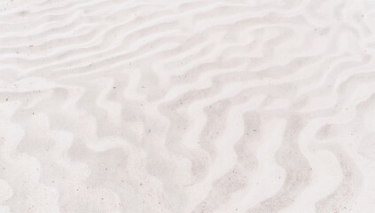 Obraz premium Lines on the beach sand texture, abstract patterns in lighter tones, seasonal change