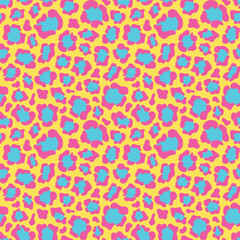 Vibrant leopard motif seamless pattern. Bright animalistic style background design. Fashion vector illustration