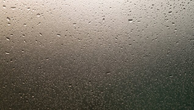 Water droplets on glass surface, morning condensation, seasonal change