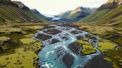 Mountainous Valley Scenery Unfolds with Serene River Flow, Inviting Viewers to Embark on a Journey of Exploration and Discovery, Perfect for Travel, Outdoor Activities, or Personal Growth.