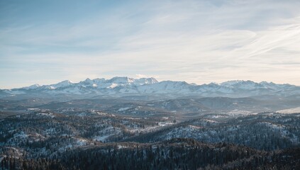 A breathtaking perspective of the snow-covered mountains, showcasing seasonal change