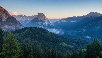 Obraz premium Aerial view of majestic mountains and forests, showcasing natural beauty and seasonal change