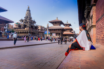 Nepali Newari Girl in Traditional Attire Gracefully Posing for Photoshoot at Patan Durbar Square
