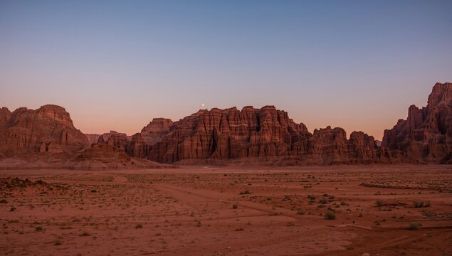 Red rock formations of a desert canyon, highlighting erosion risk, Earth Day