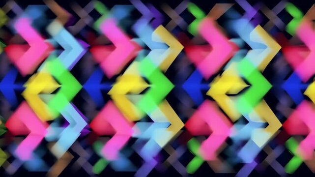 Abstract pattern of layered, blurred geometric shapes in a colorful array on a dark background