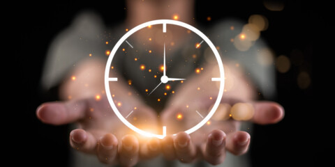 A glowing clock hovers above open hands, symbolizing the value of time, productivity, and focus....