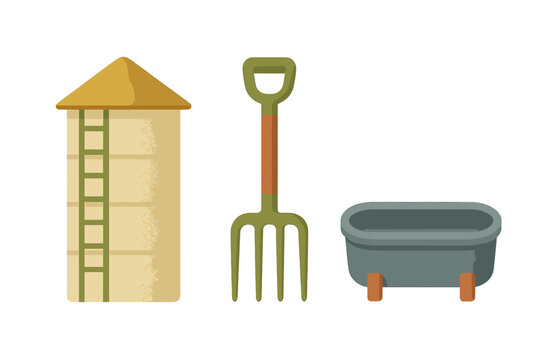 Tall grain silo, green pitchfork, and animal feeding tub used in agriculture